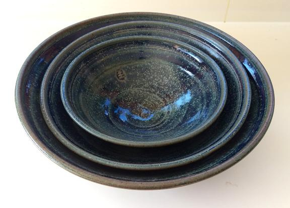 Set of 3 blue stacking bowls.